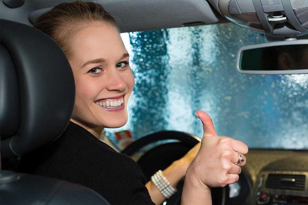 happy-woman-in-car