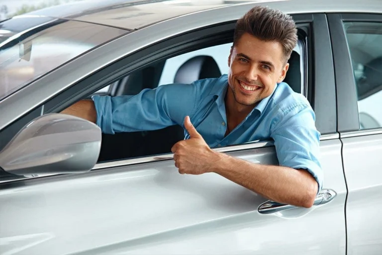Man sitting inside a car